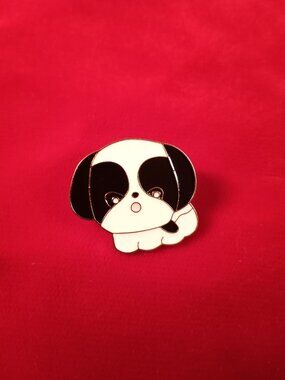 Adorable black and white puppy dog enamel pin